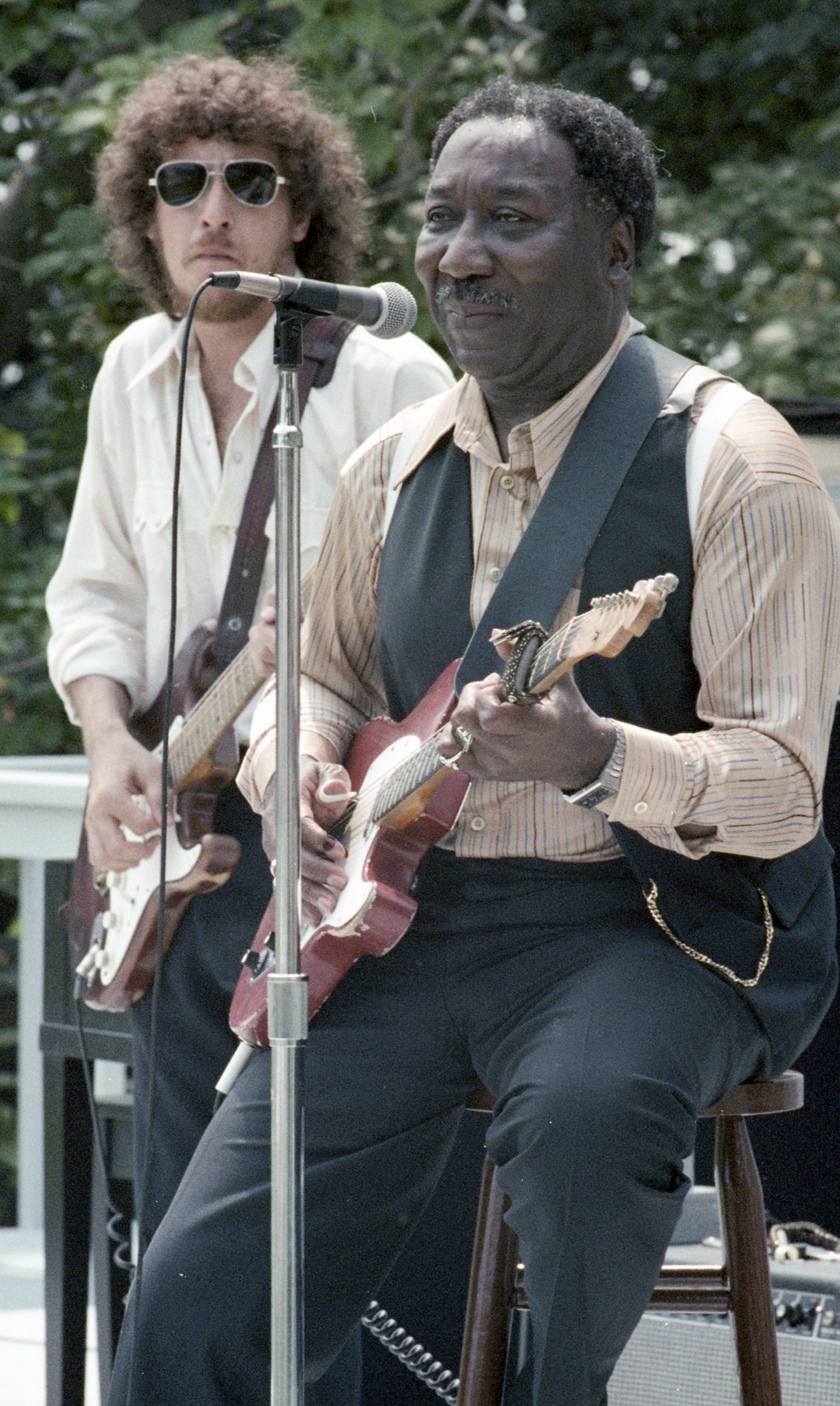 Guitarists performing together