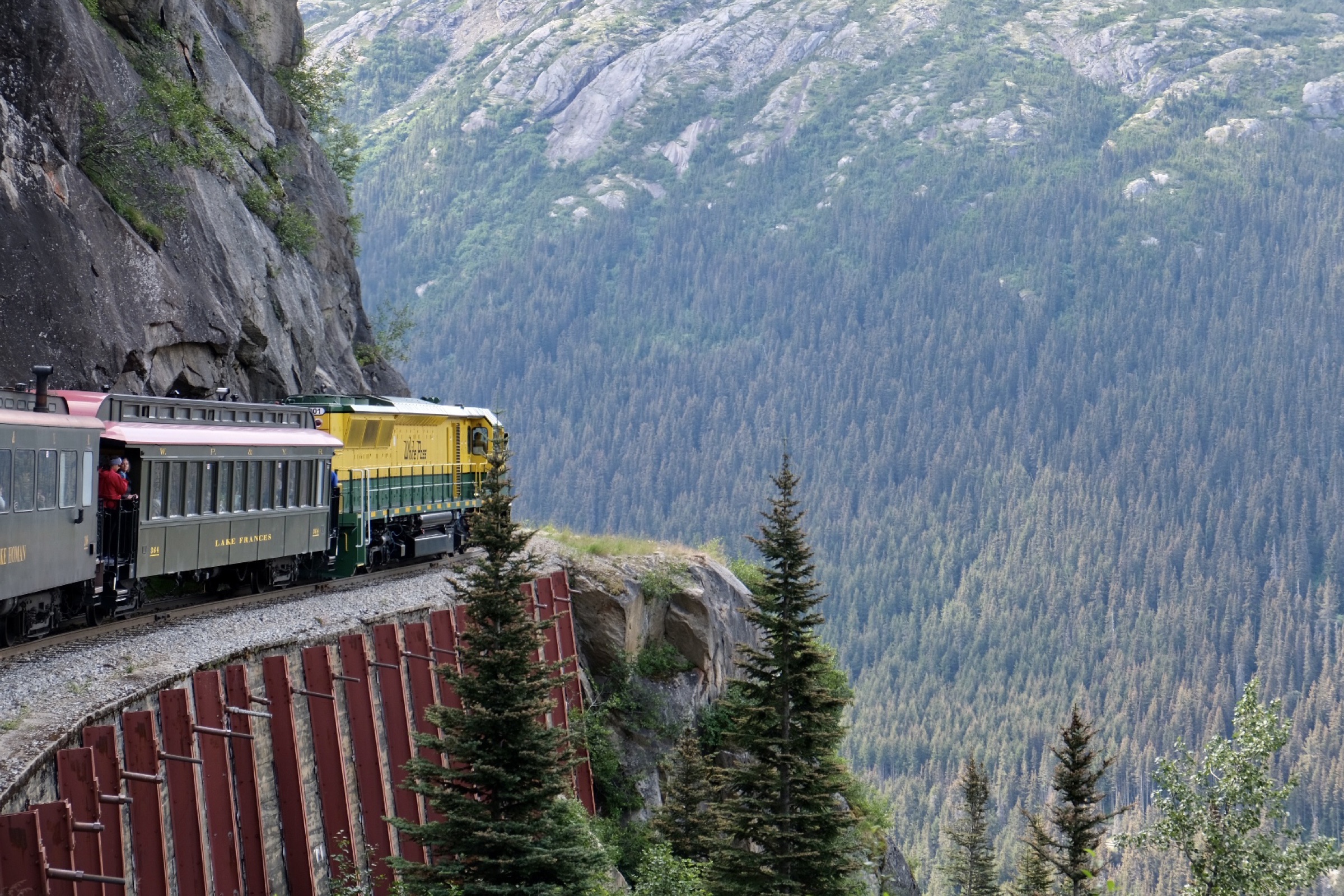 Train along an Alaskan mountainside