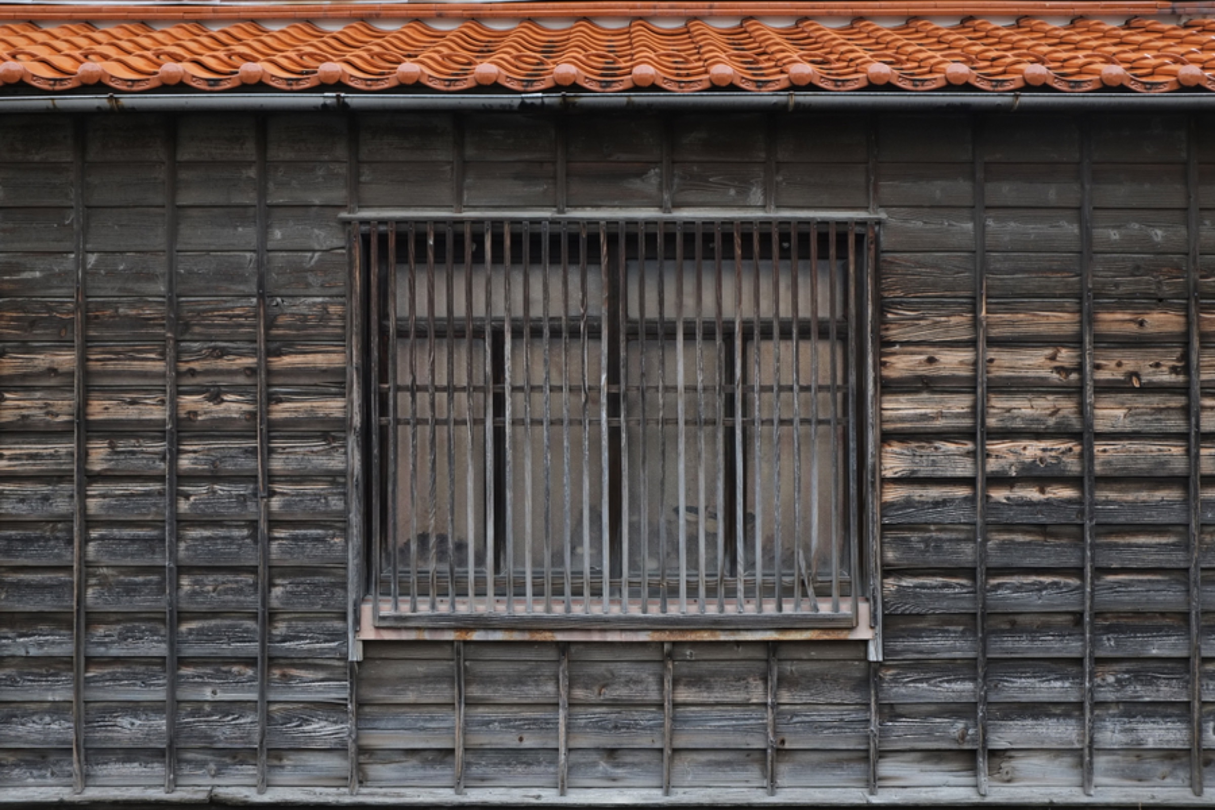 Weathered wooden house front in Japan