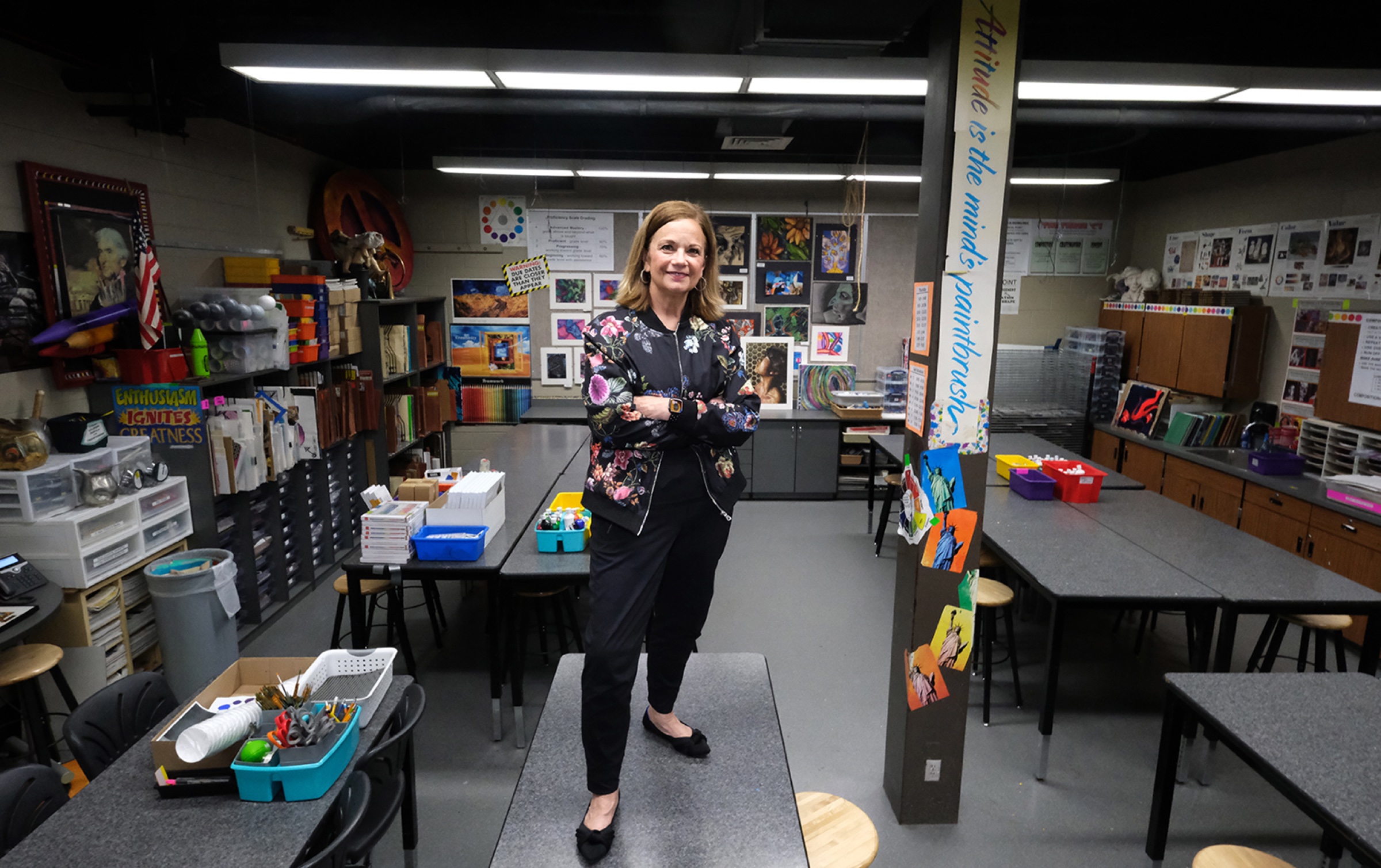 Woman standing in an art classroom